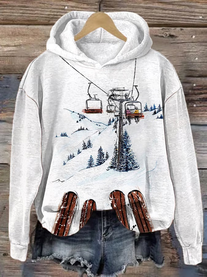 16. Montagne - Sweat-shirt à capuche décontracté à manches longues et imprimé ski pour femme