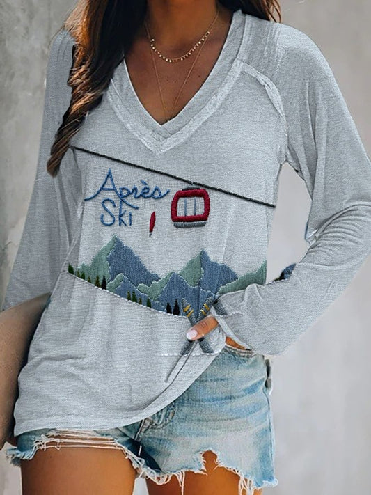 35. T-shirt col V imprimé après-ski pour femme