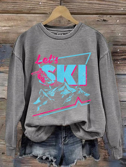 9. Lets ski - Sweat imprimé ski rétro pour femme